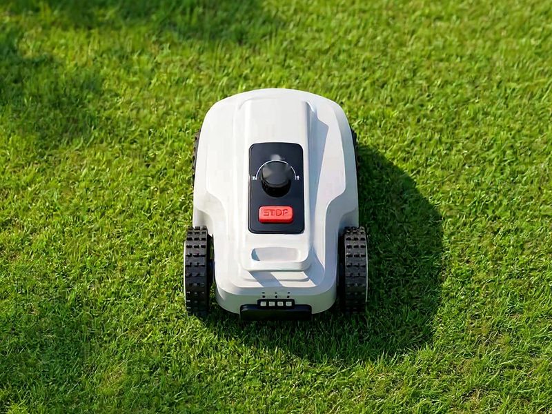 Top-down view of VERDA showing the red STOP button on its control panel